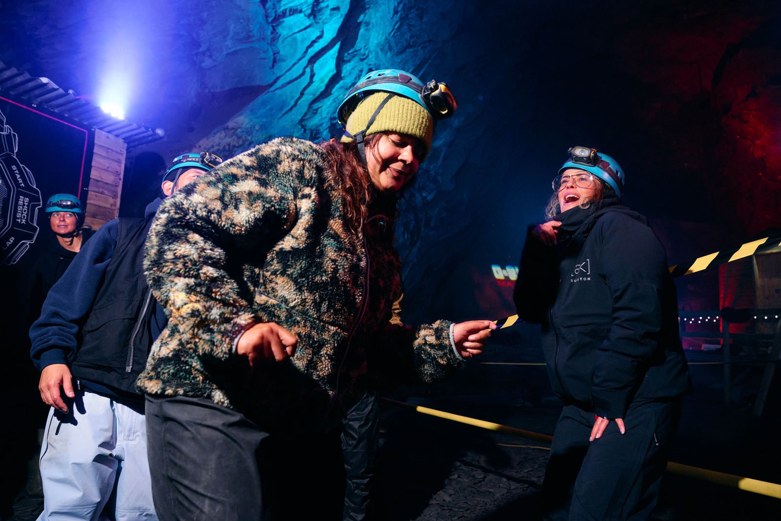 Dancing in the chamber, in helmets and head torches.
